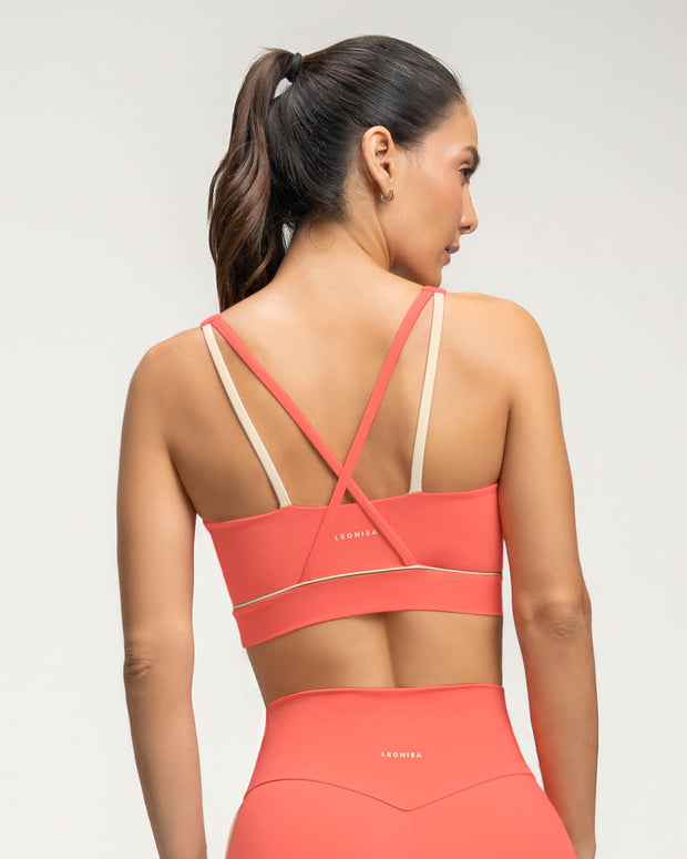 Top deportivo con tirantes dobles en espalda#color_369-coral