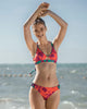 Braga de bikini tiro bajo con laterales graduables elaborado con pet reciclado#color_632-fucsia-estampado
