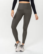 Legging deportivo de control con prácticos bolsillos laterales